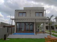 Araya Beach Casas Hotels in Lian
