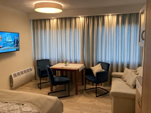 Your apartment with a wonderful panoramic view of the Burgtiefe marina - 3-Star