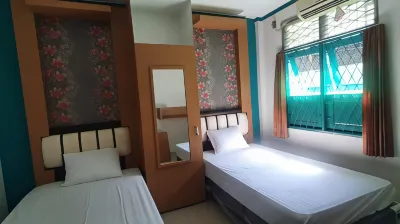 Rumah Kost Dempo Hotel dekat Taman Bank Mandiri