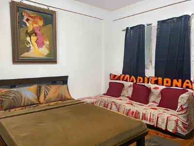 Alona's Traditional Filipino Home Near 100 Islands Wharf Hotels in Bani