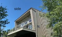Modern family-sized chalet at private lake - 2-Star