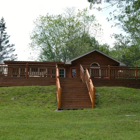 Spectacular Catskill Mountain River Front Custom Log Home