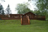 Spectacular Catskill Mountain River Front Custom Log Home