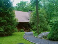 Rare private cabin retreat surrounded by 1700 acres of woods, yet close to town.