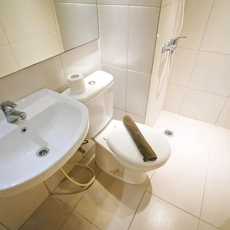 Comfy Studio Connected to Mall at Tanglin Supermall Mansion Apartment By Travelio Hotels in Sambikerep