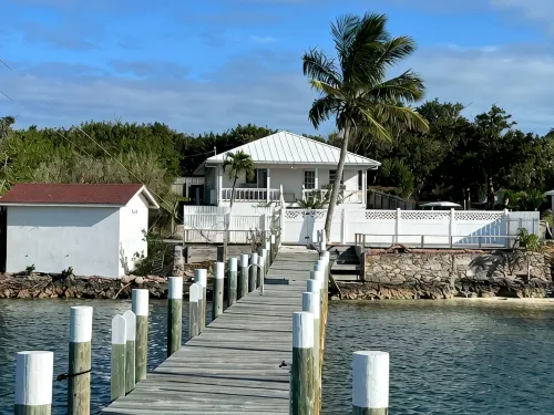 Waterfront Beach Bungalow with 150 Foot Dock on Guana Cay and Waterside Pergola - Homestays