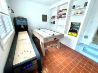 Charming Coastal Cape Cod w/ King Bed, Bikes, & Game Room near Downtown Beach - Wifi