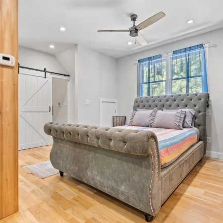 Studio above a detached garage away from main house on a private lot.