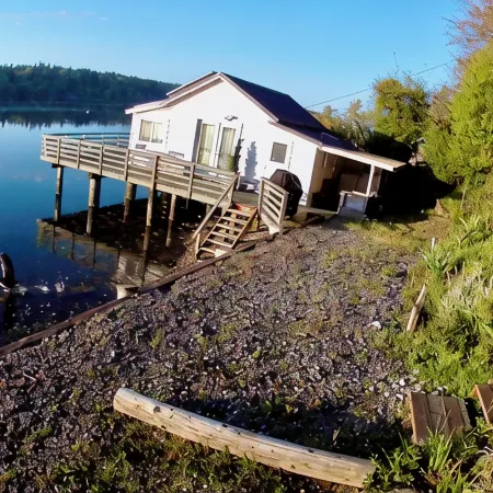 Secluded Overwater Eco-Cottage on Private Beach