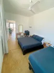 Apartment with mountain view, private balcony and access to beach front terrace. - Homestays