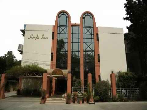 Herfa Inn Hotel Lahore Отели рядом с достопримечательностью «Guddi Ground»
