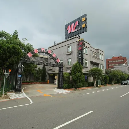 WUNSIN MOTEL Отели рядом с достопримечательностью «Тематический парк Window on China»