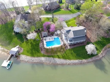 Waterfront Home - Large Pool, Boat Dock + Screened Boat House & Pool Cabana