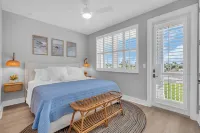 Coastal Luxe Villa! Tranquil 3-Story Retreat with Bay Views near Anna Maria Isl