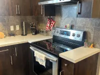 Basement suite with full kitchen Hotels in Airdrie