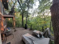 House in the trees with City View