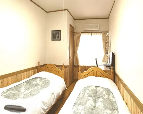 Guesthouse Manmaru โรงแรมในยากุชิมะ