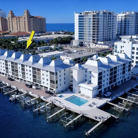 Vanderbilt Beach Condo, Bay Views, New Saltwater Pool, Walk to Beach