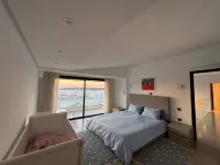 Blue Lagoon duplex with views of cape blanc, sea x1f30a;, grotto beach and forestx1f333; - Homestays