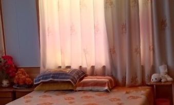 Fangdongmin Xingfu Xiang Huaer Yiyang Featured Homestay (Fulong Dongjie Branch)