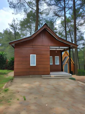 Triangle House Cozyland Hoteles en Cibogo