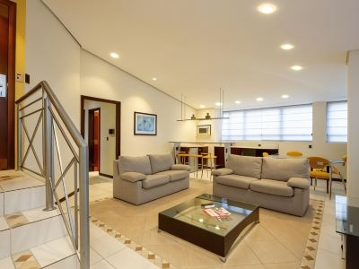 Le Village Flats e Hotel