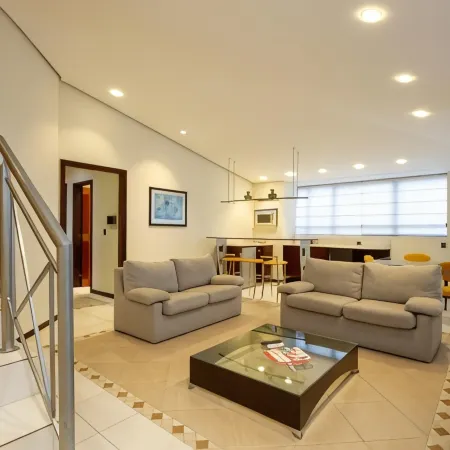 Le Village Flats e Hotel