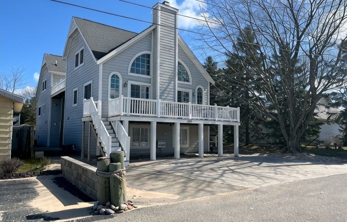 Sleeps 24+! Large home steps from Lake Michigan with views of the Lighthouse