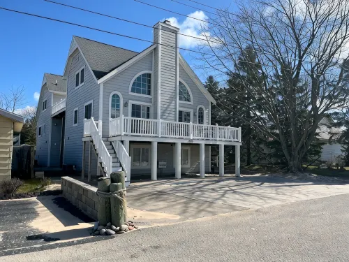 Sleeps 24+! Large home steps from Lake Michigan with views of the Lighthouse