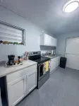 Cozy 2-bedroom apartment in the heart of Bayamón with WiFi & AC - 民宿