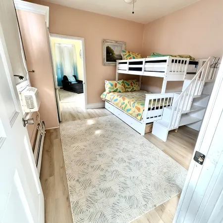 Ocean Views, seconds to the beach, and a 5 minute walk to downtown shopping!