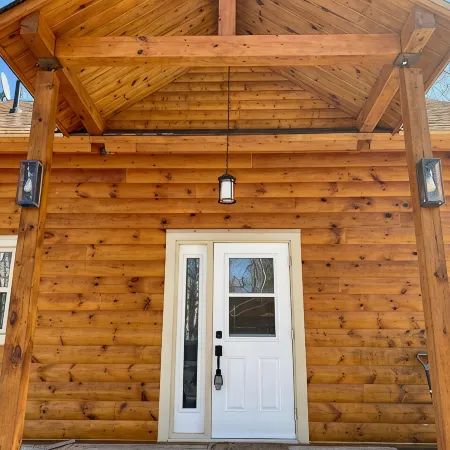 Log Cabin across from ski Wentworth, with outdoor fire pit and BBQ