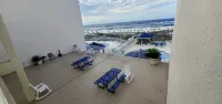 Cozy Beach Condo with Private Beach, Heated Pool, High Speed WiFi, and More.