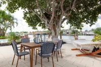 Beautiful Waterfront Condo on Canal with Pool & Walk to Beach! Boat Watch! 2b/2b