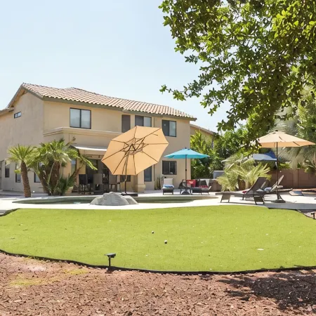 Resort Backyard with Pool, Spa & Putting Green