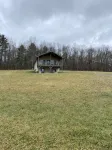 Family friendly cottage, covered deck, close to lake to fish, swim, and boat - 3-Star