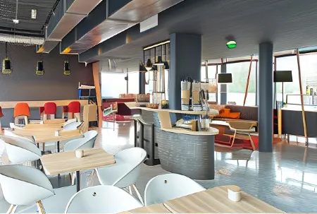 Nomad Paris Roissy CDG Отели рядом с достопримечательностью «Espace Musée Aéroport Charles de Gaulle Terminal 2E»