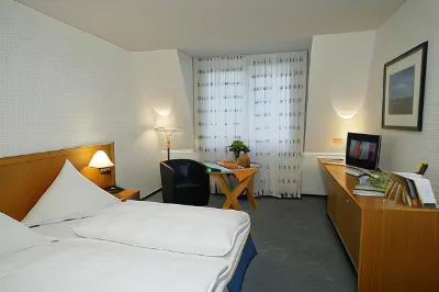 Stadthotel Oranienburg Отели в г. Вандлиц