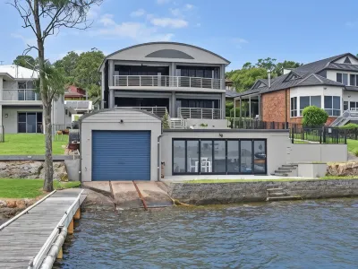 Sealand Lake House Stunning Absolute Waterfront Hotels near Shazzam Bridal & Formal