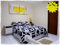 Suítes de Setiba - Hospedaria Oca Ruca Hotel a 