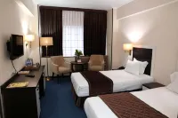 Le Grande Plaza Hotel