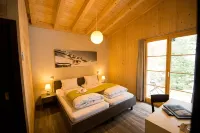 Hüttenhotel Husky Lodge - Homestays