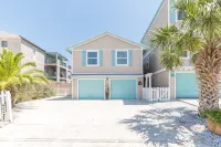 Waterfront home with dock, heated pool, & spectacular views- walk/bike downtown!