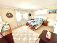 Tuncurry Tranquility family and dog friendly house / garden conveniently located
