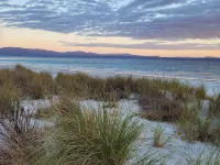 Roaring Beach Retreat - pet friendly, beachfront Hotels in Geeveston