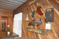 Cozy River front cabin w/Private natural spring. Pet Friendly!