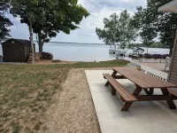 NEW! Renovated lakeside cottage with a private sandy beach. Great Location!