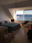 A studio located in a house directly on the beach in a stunning maritime site - 民宿