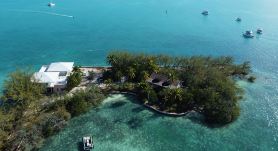 A rare combination of central location convenience & private island seclusion