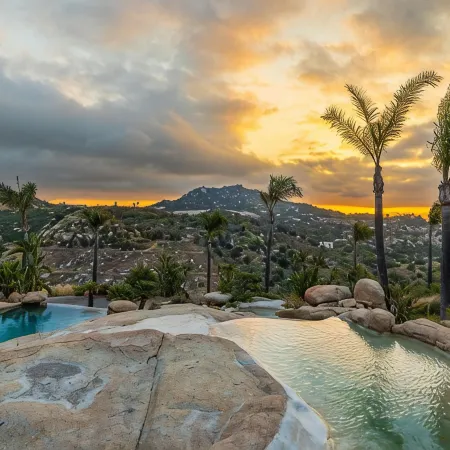 Castle on a hill, breathtaking views, surrounded with pools, trees, and lawn